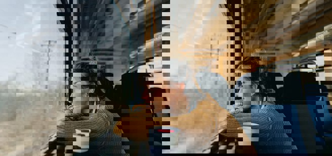 Woman looking in train